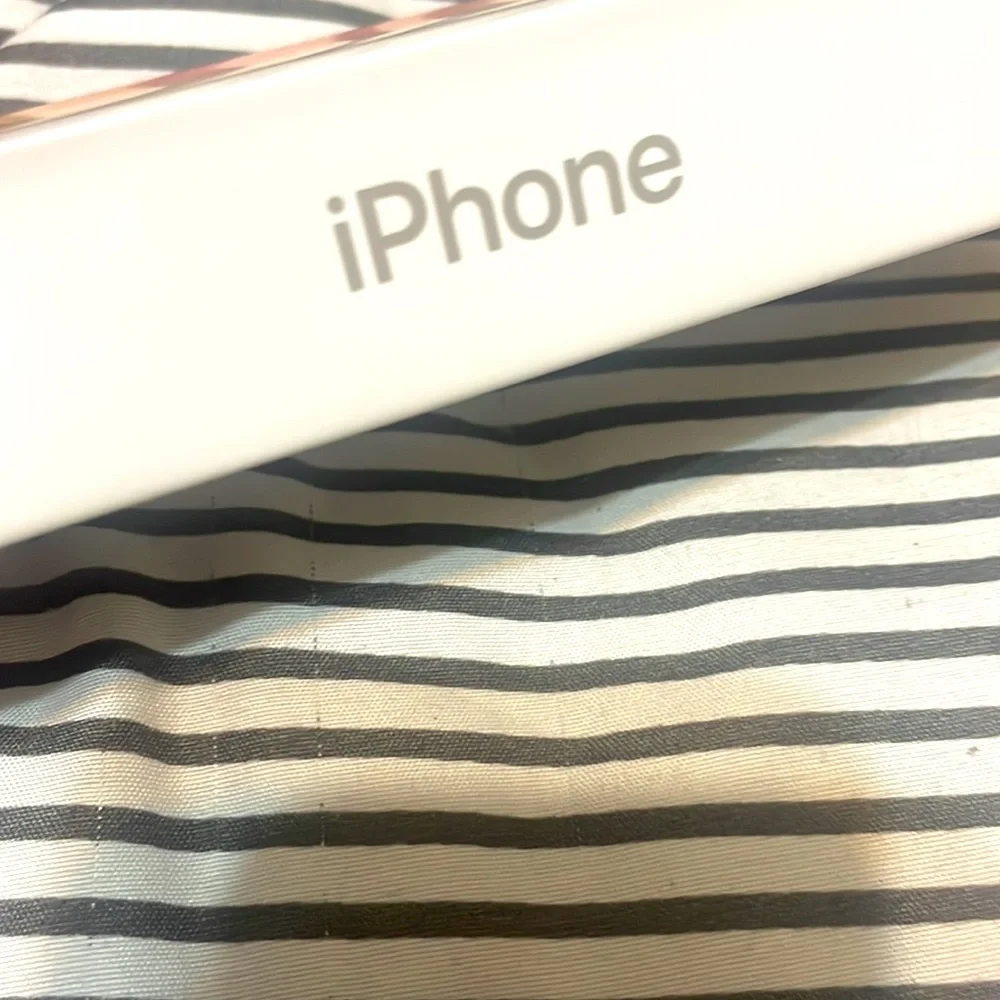 Apple iPhone 12 mini box and USB-C to Lightning Cable. No phone included.